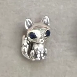 Charm zorro de ojos azules