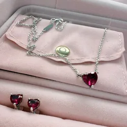 Conjunto cadena y aretes piedra roja 