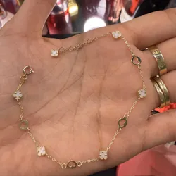 Manilla Van Cleef flores blancas de oro 10 k
