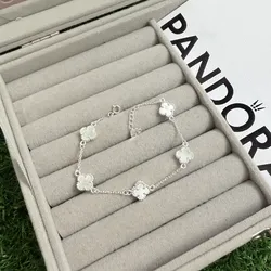 Manillas Van Cleef de 5 flores blancas