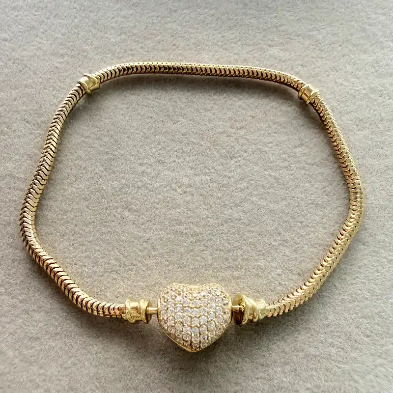 Pandora de oro 10 k cierre corazón 