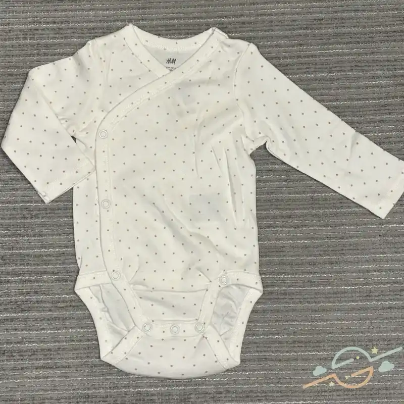 Body blanco puntos rosa H&M 