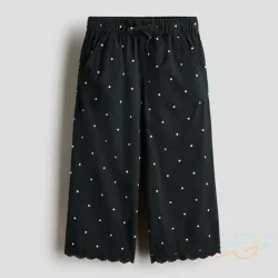 Pantalón negro de puntos H&M