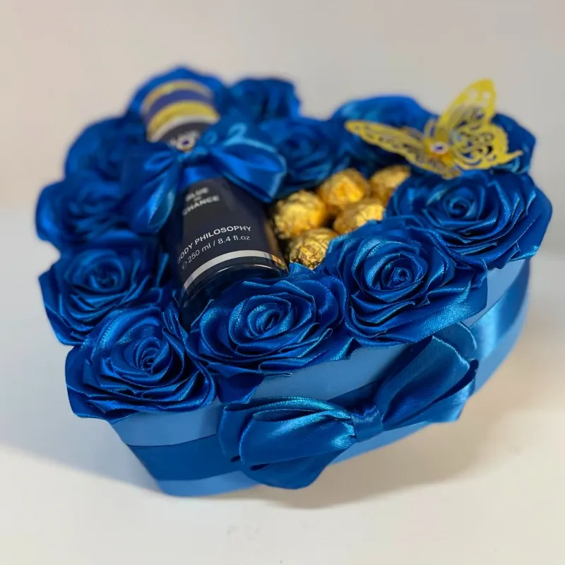 Caja de regalo en forma de 💙 en azul