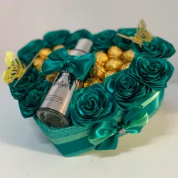 Caja de regalo en forma de 💚 en verde