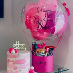 Globos de golosinas con pastel 