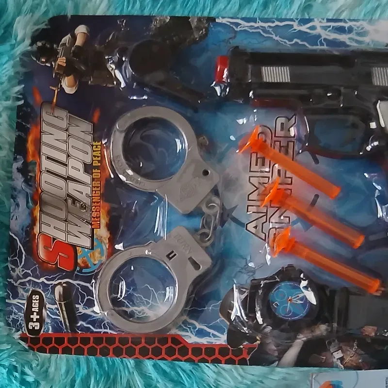 Juego de pistola con esposas