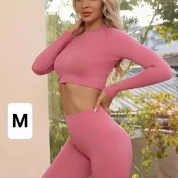 Conjunto blusa corta mangas largas y licra.