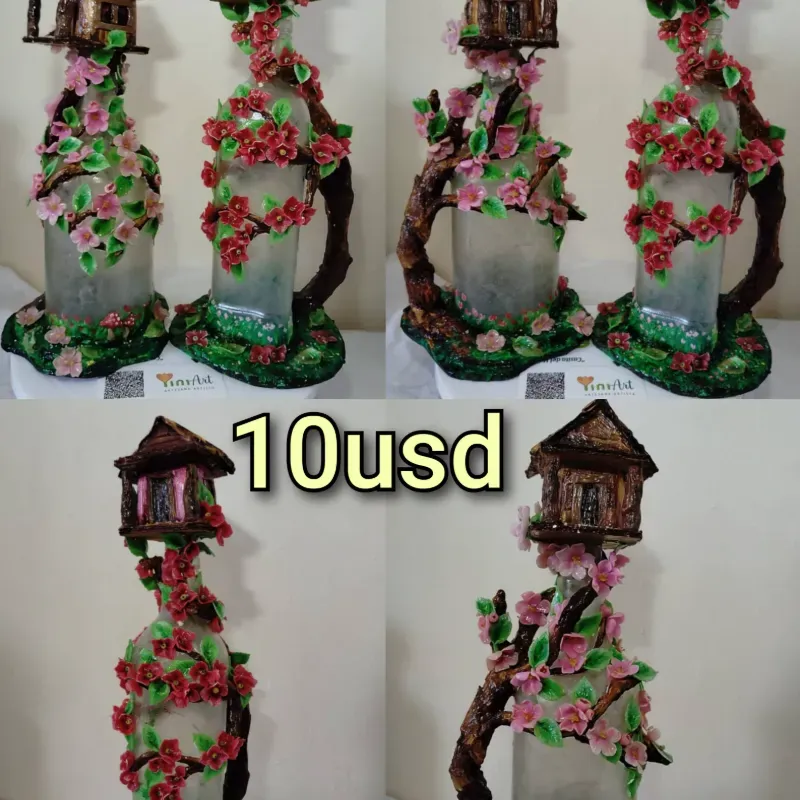 Lámpara artesanal casa en el árbol.