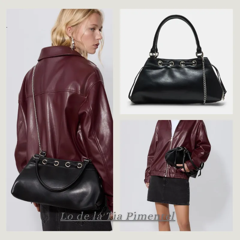 Bolso negro hombro ojales 