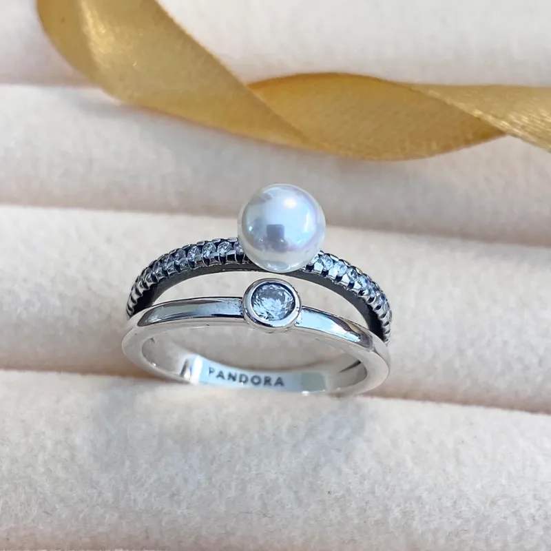Anillo doble con perla 