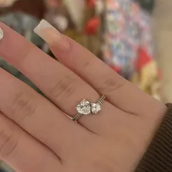 Anillo doble corazón