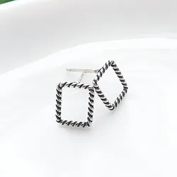 Aretes artesanales cuadrados torcidos 