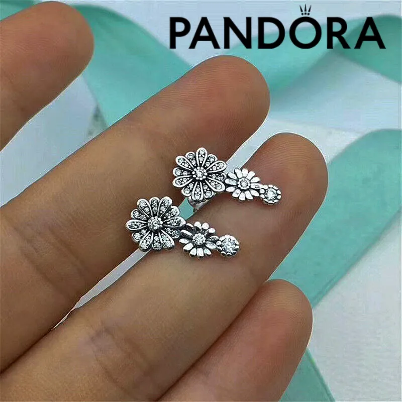 Aretes de Pandora margaritas triples 