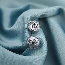 Aretes nudito