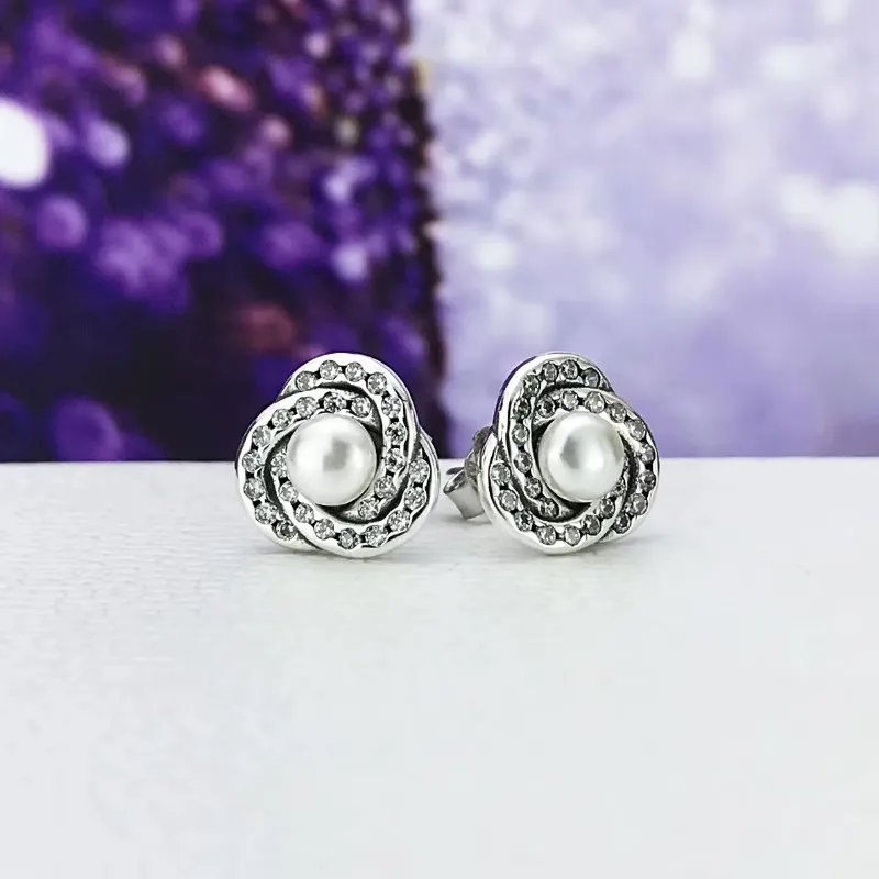 Aretes Pandora nudito perla
