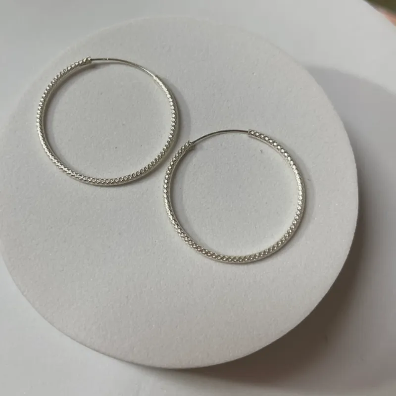 Argollas en textura serpiente originales