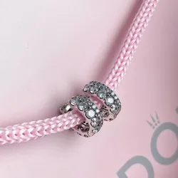 Argollas Pandora dobles en pedrería 