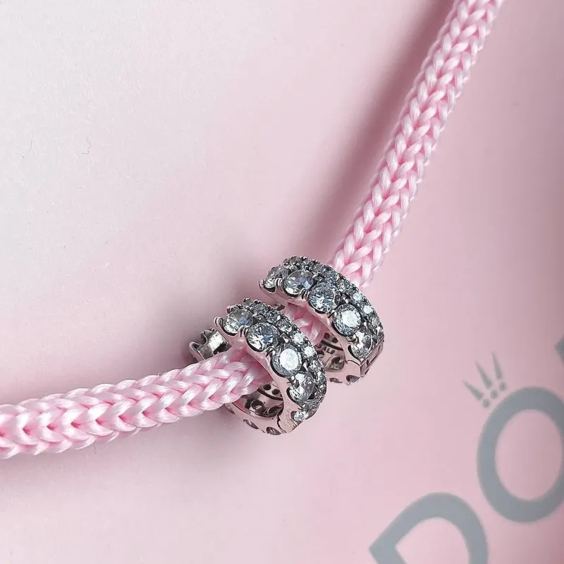 Argollas Pandora dobles en pedrería 