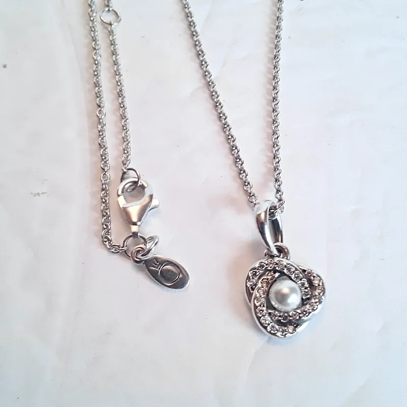 Cadena Pandora nudo con perla de cultivo 