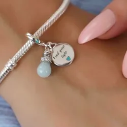 Charm bombillo