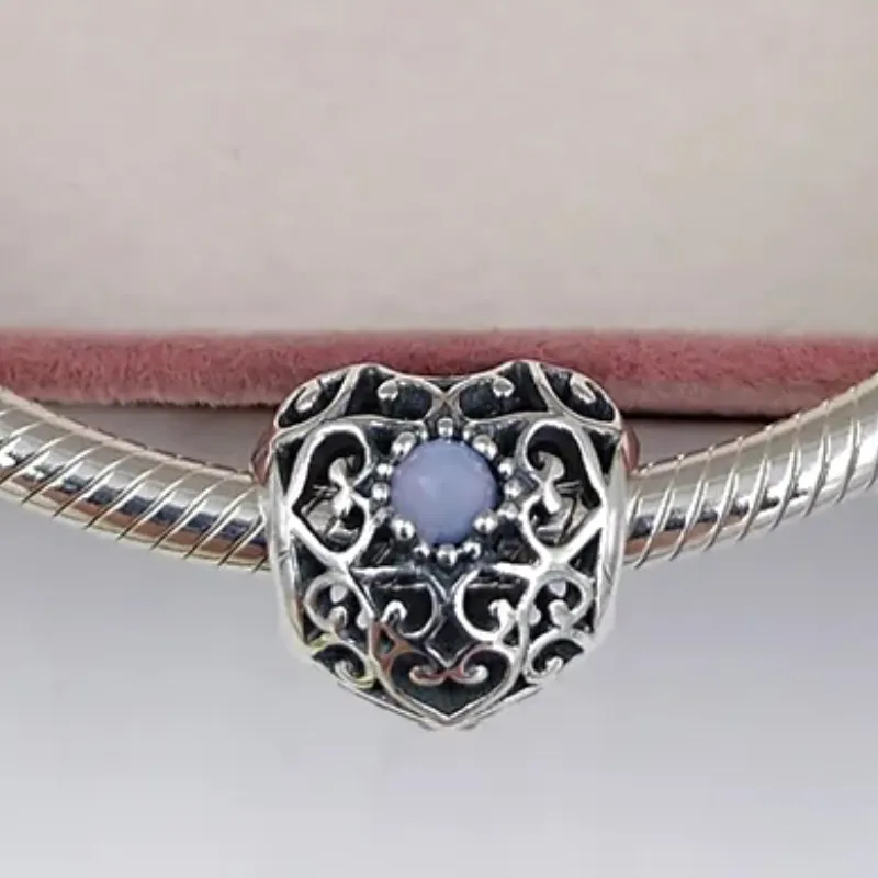 Charm corazón enredado tornasol