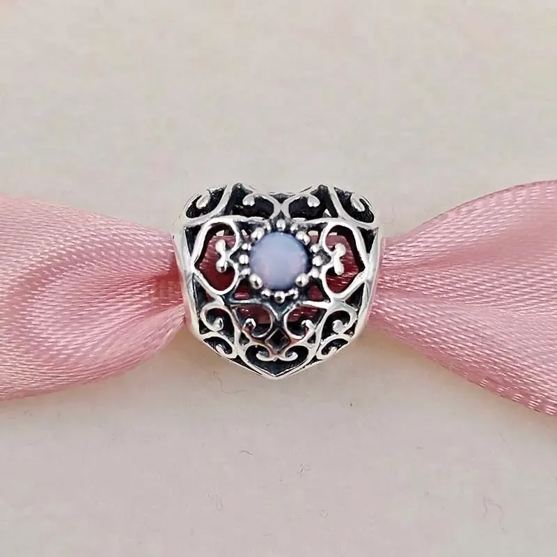 Charm corazón enredado tornasol