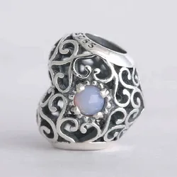 Charm corazón enredado tornasol