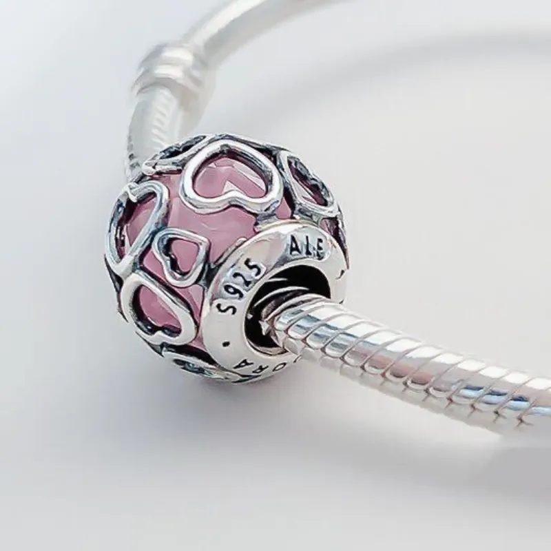 Charm corazones cristal rosa
