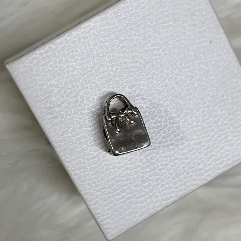 Charm de plata bolsa de compra