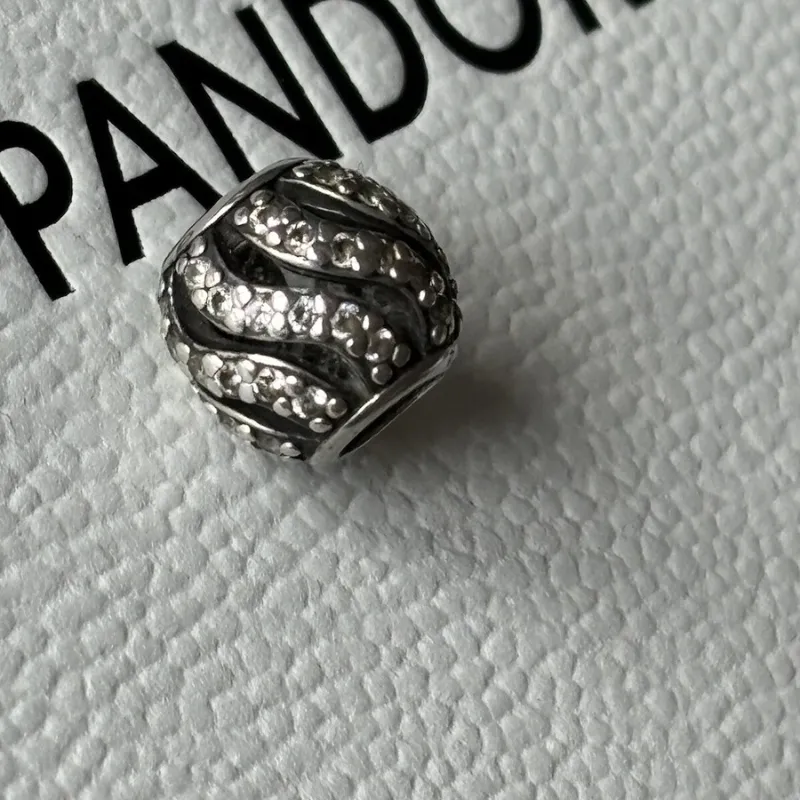 Charm de plata separador