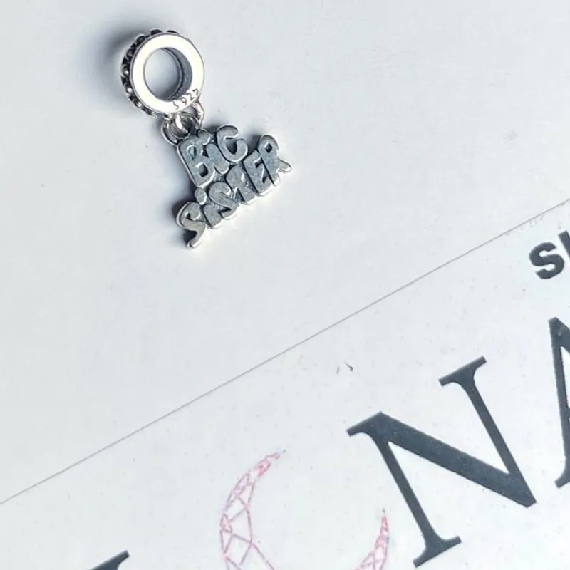 Charm hermanas