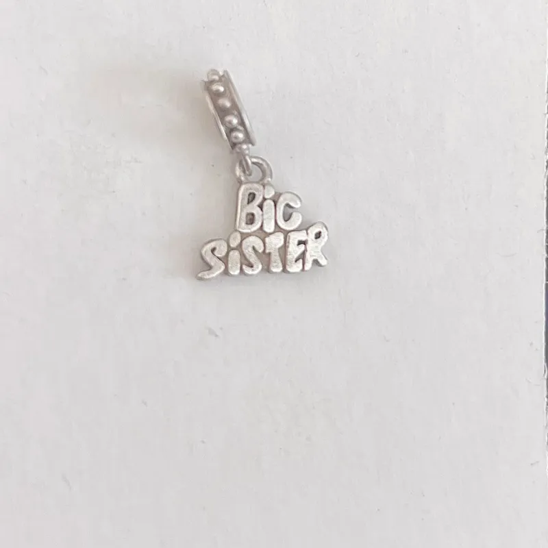 Charm hermanas