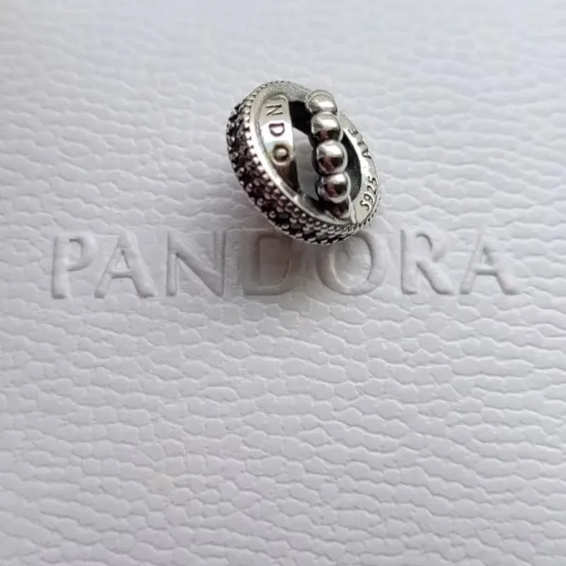 Charm separador enredado Pandora