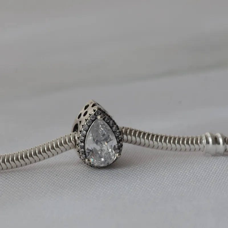 Charm separador lágrima 