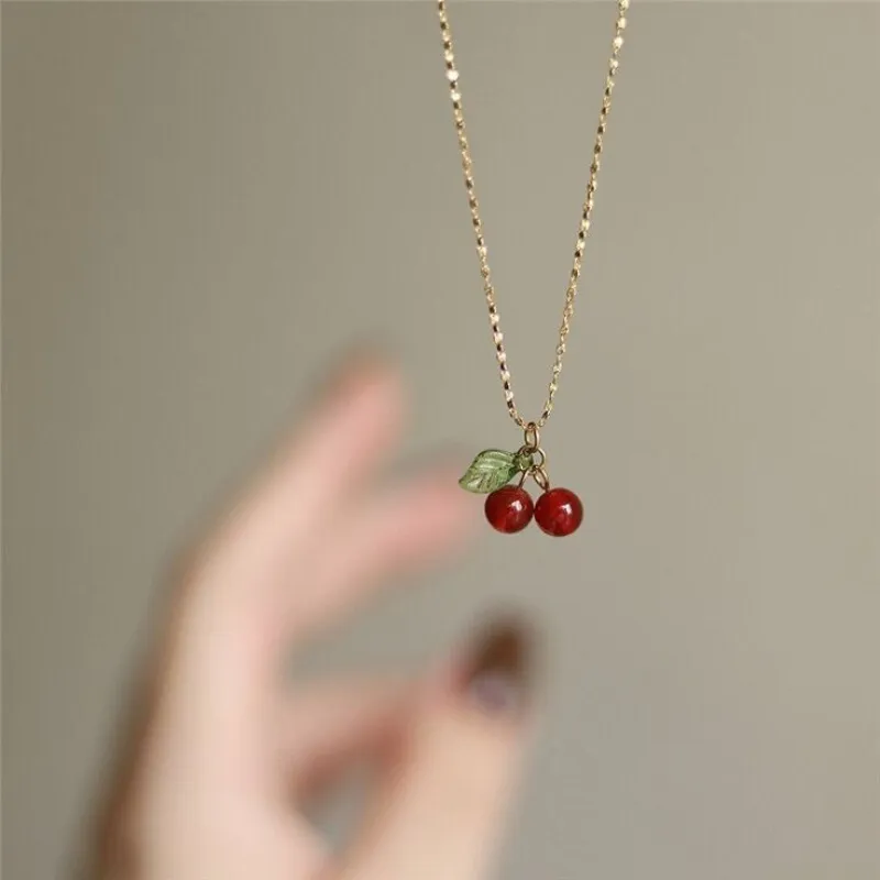 Cadena de acero inoxidable con cereza solitaria 