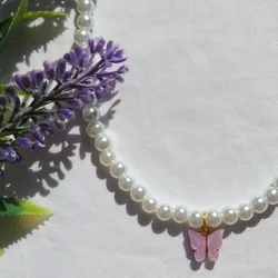 Collar de perlas con mariposas 