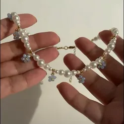 Collar perlado con flores de vidrio 