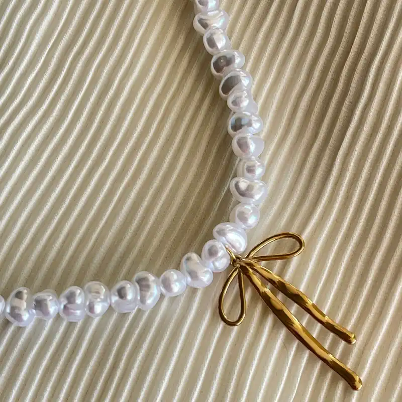 Perlas de rio y lazo