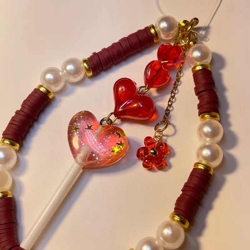 Strap de teléfono con caramelo 
