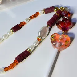 Strap de teléfono con caramelo 