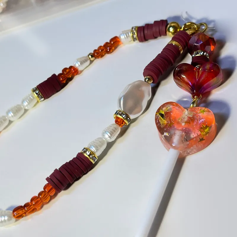 Strap de teléfono con caramelo 