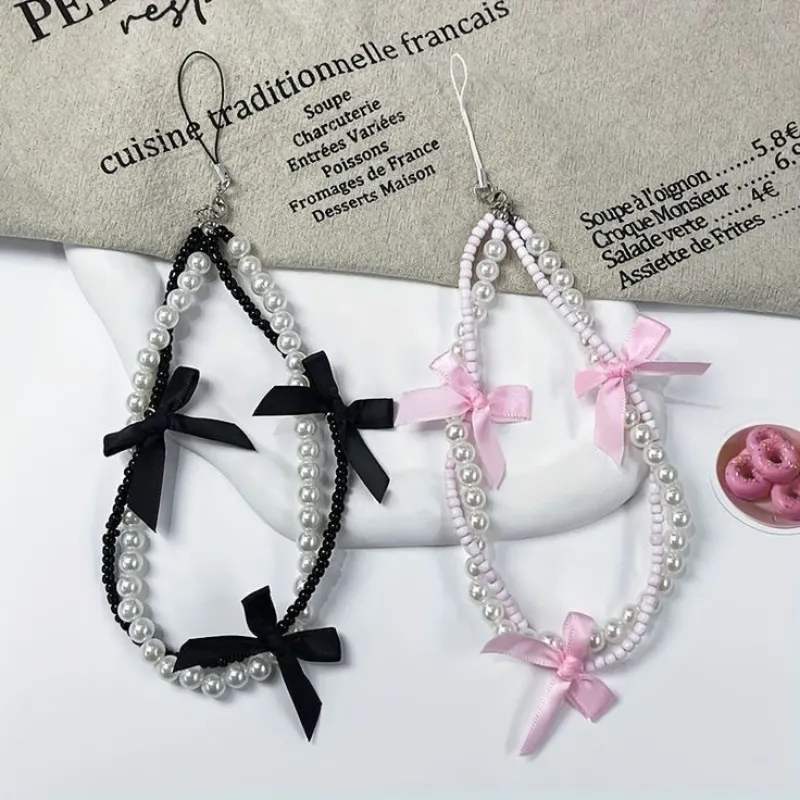 Strap de teléfono de perlas y lazos 