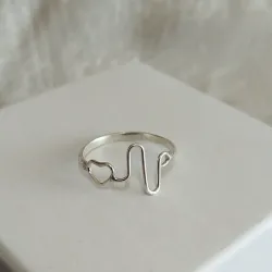 Anillo de figura 