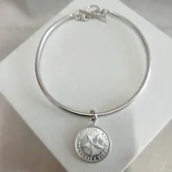 Pulsera con moneda 