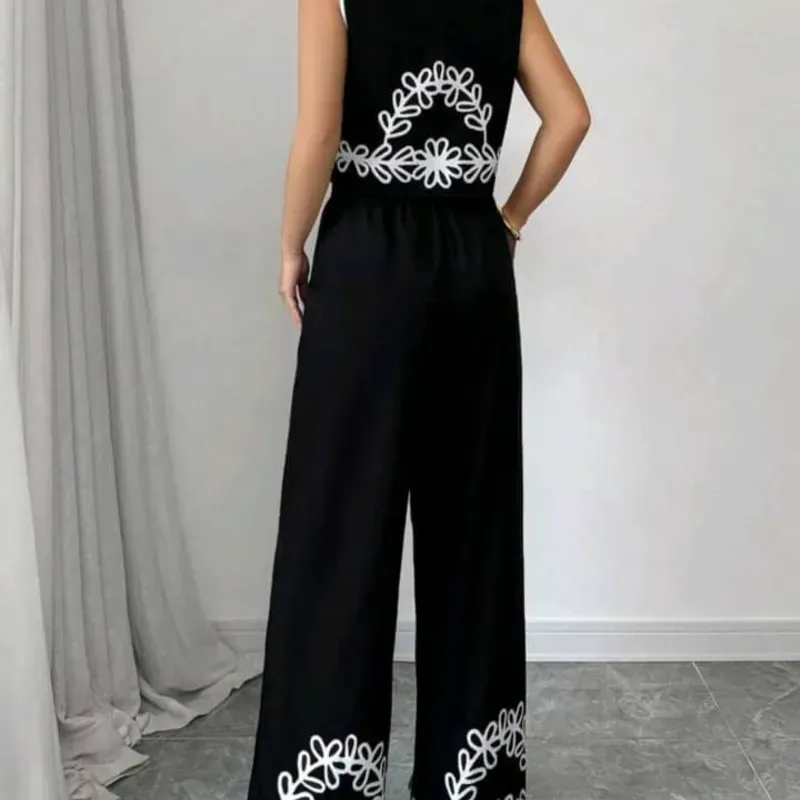 CONJUNTO 2 PZS PARA MUJER	PANTALON NEGRO FLORES BLANCA