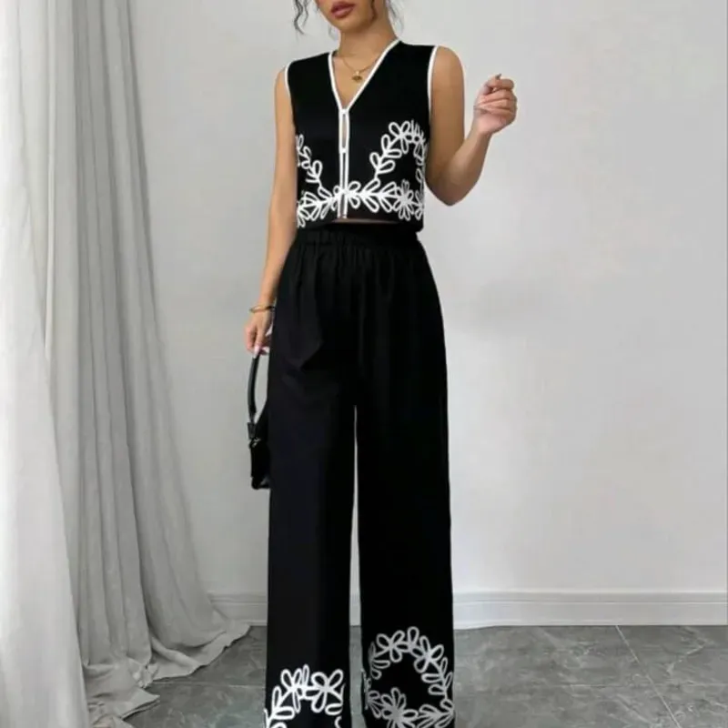 CONJUNTO 2 PZS PARA MUJER	PANTALON NEGRO FLORES BLANCA