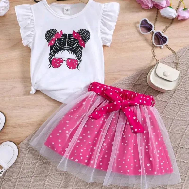 CONJUNTO 2 PZS PARA NIÑA	BLANCO Y ROSA FUSIA, CAMISETA MUÑEQUITA FALDA LUNARES CON CINTURON