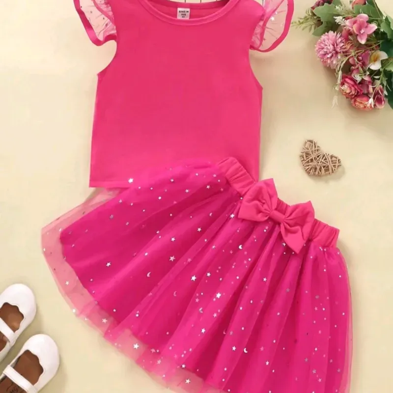 CONJUNTO 2 PZS PARA NIÑA	ROSA FUSIA, BLUSA CON MANGA DE MALLA Y FALDA CON MOÑO