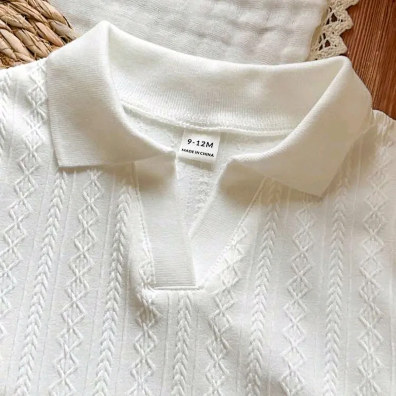 CONJUNTO 2 PZS PARA NIÑO	BLANCO, PULOVER CUELLO V Y CHORT CO-09